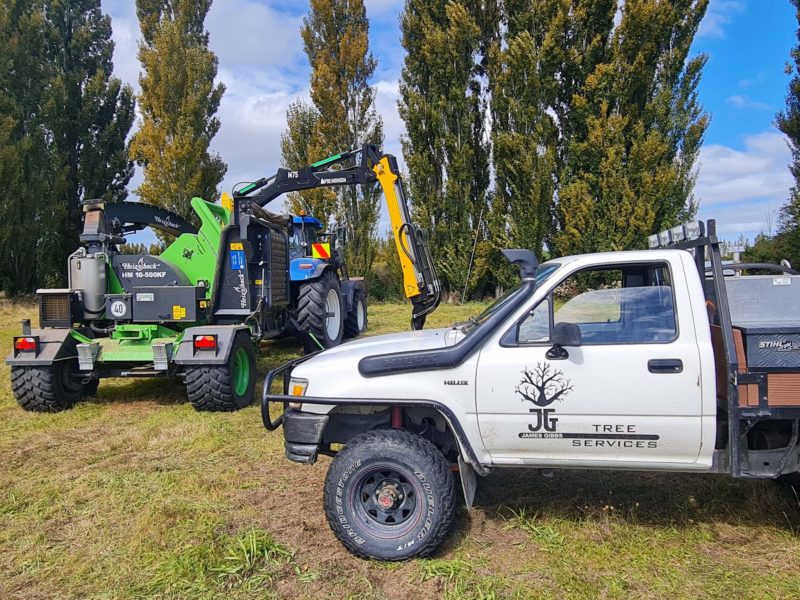 The JG Trees tractor and wood chipper on a farm in Christchurch, Canterbury